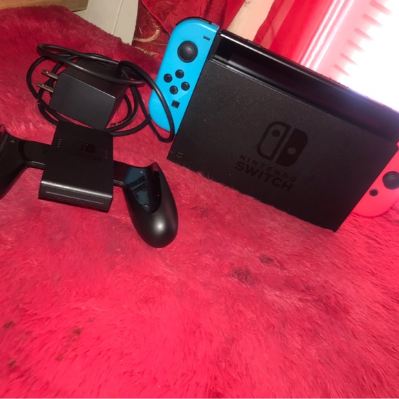 Nintendo switch for sale colors blue, red and black available for pick up only - Picture 1 of 5